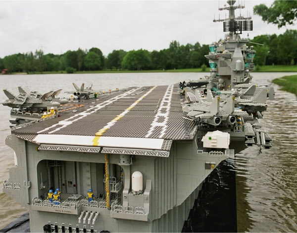 A copy of the aircraft carrier Harry Truman. The aircraft carrier itself and the aircraft are completely made up of LEGO cubes.